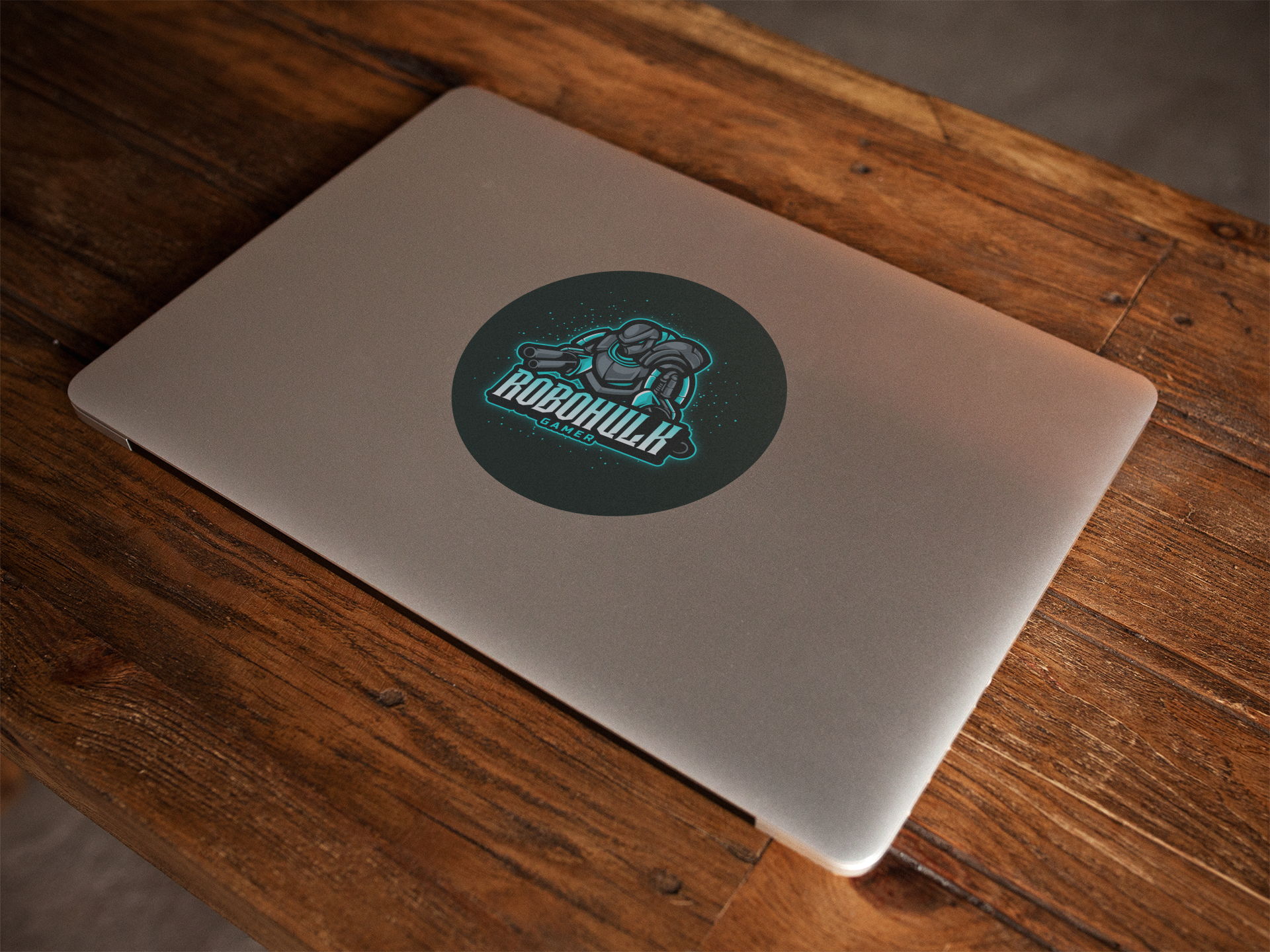sticker-on-a-closed-macbook-over-a-wooden-surface-template-a14334